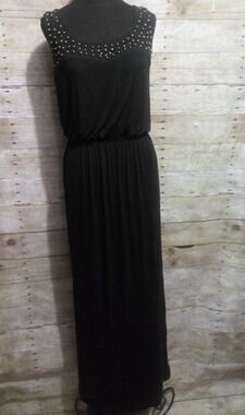 Alyx black dress with a copper beaded neck…